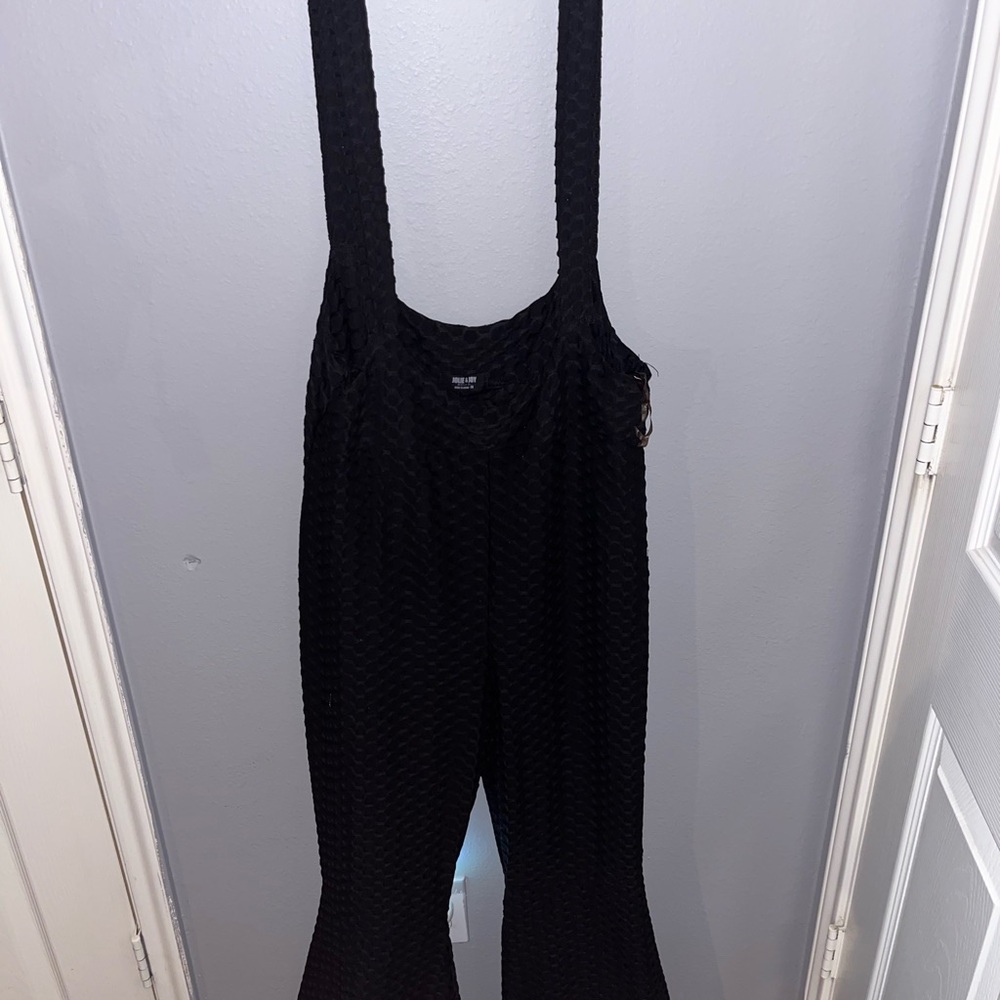 Sleek Black Sleeveless Jumpsuit with Full-Length Pants